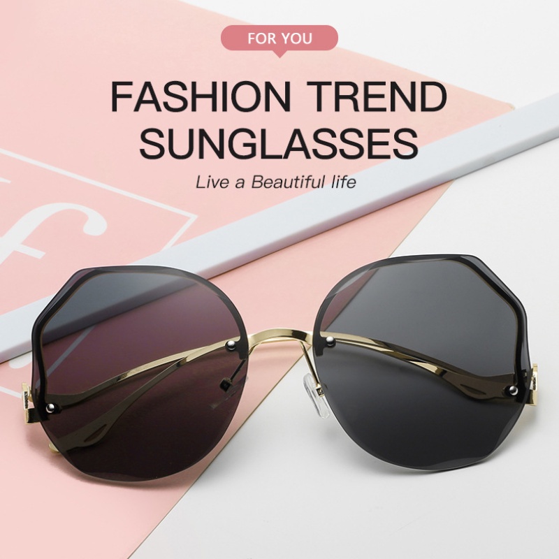 Kacamata Hitam Oversize Tanpa Bingkai Bentuk Bulat Bahan Logam Gaya Retro Untuk Wanita