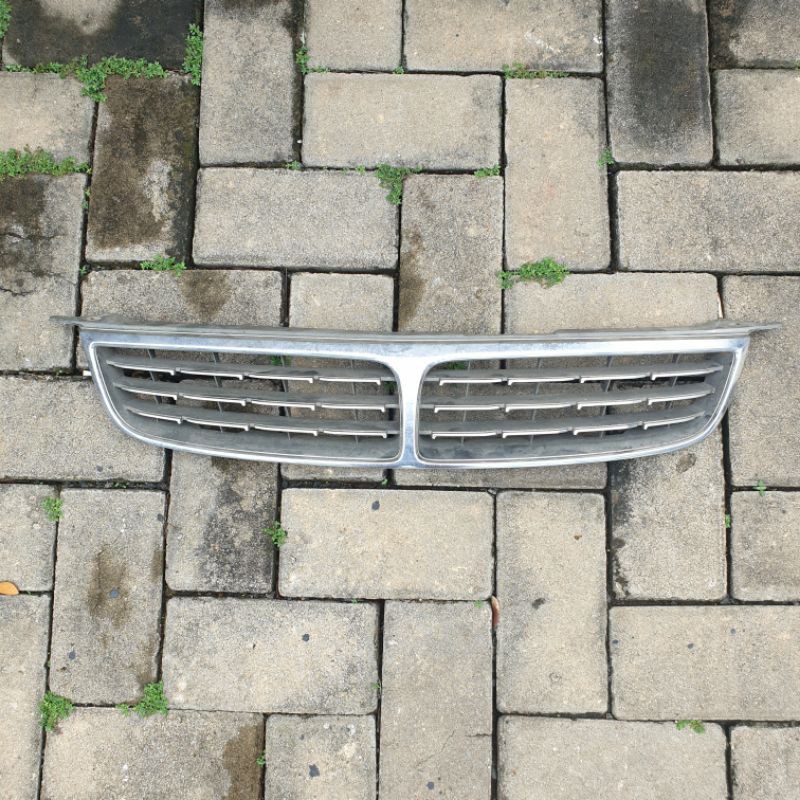 Grill OEM allnew corolla AE112