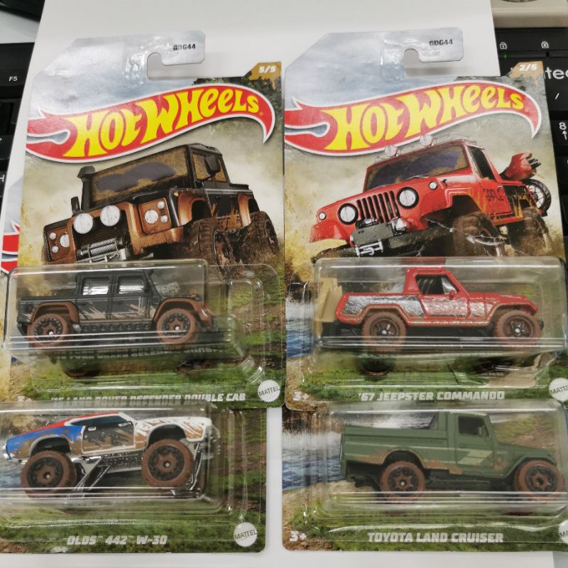 Hot Wheels MUD UNIVERSAL ASSORTMENT Toyota Land Cruiser 15 Land rover Defender double cabin olds 442 w30 67 jeepster commando mercedes benz unimog