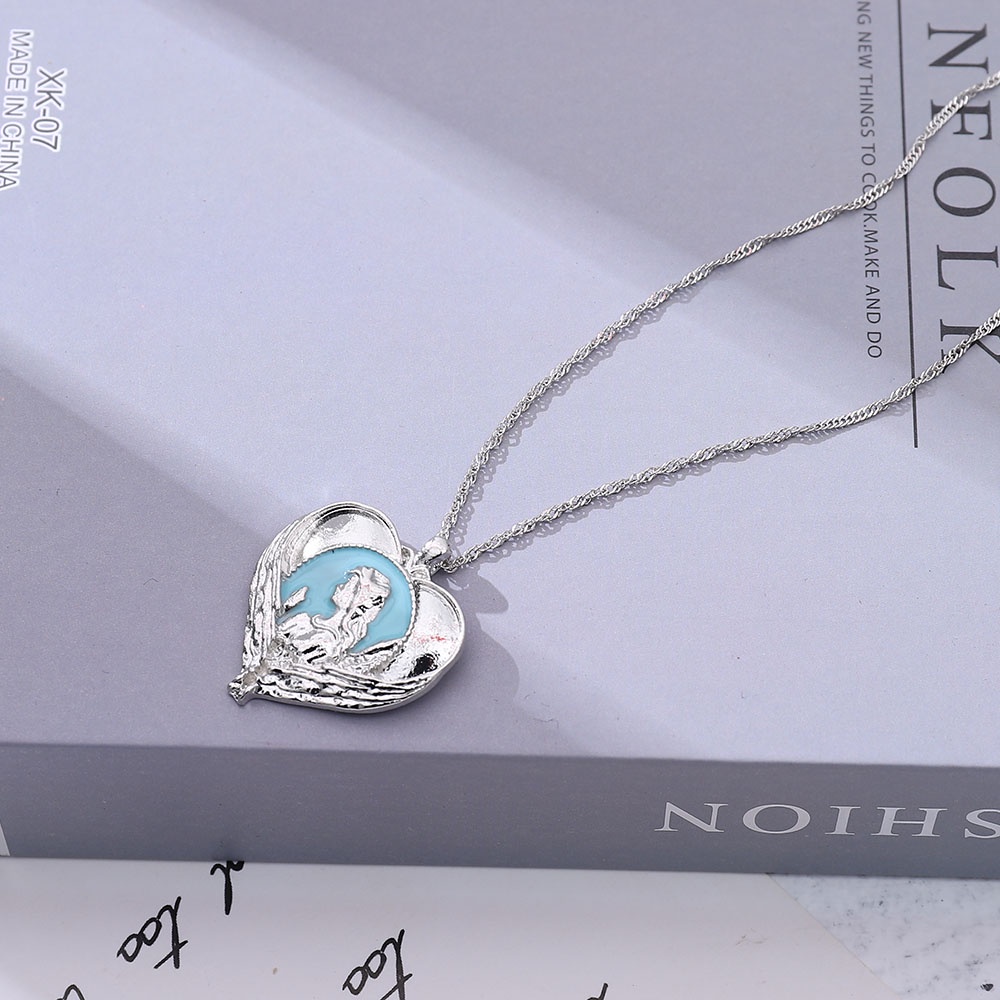 Kalung Dengan Liontin Bentuk Hati Dan Sayap Malaikat Warna Biru Untuk Wanita