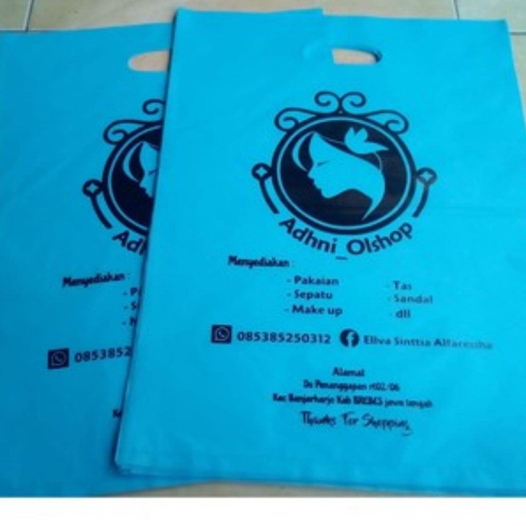 Plastik Promosi Plong Plus Sablon Plastik Baju 25x35cm isi 100pcs