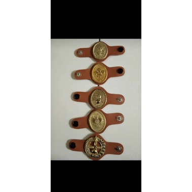 

ring Pramuka Kuningan , fiber , dan kulit