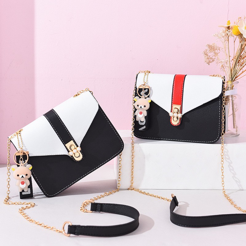 Tas Slempang Wanita Kecil New Fashion Tali Rantai dgn Boneka Lucu - WT7120