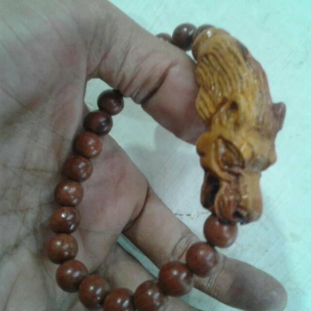 GALANG BUTIR NAGASARI UKIR SINGA