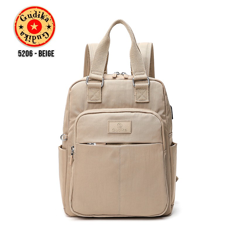 GUDIKA 5206 - Tas Ransel Laptop Wanita Kekinian Import Original Terbaru Bahan Nilon Waterproof Anti Air Premium Korea bisa muat banyak barang banyak slot kocek terlaris - tas wanita - tas cewek - tas kerja - tas laptop - rangsel - gudika bag - tas gudika-BEIGE