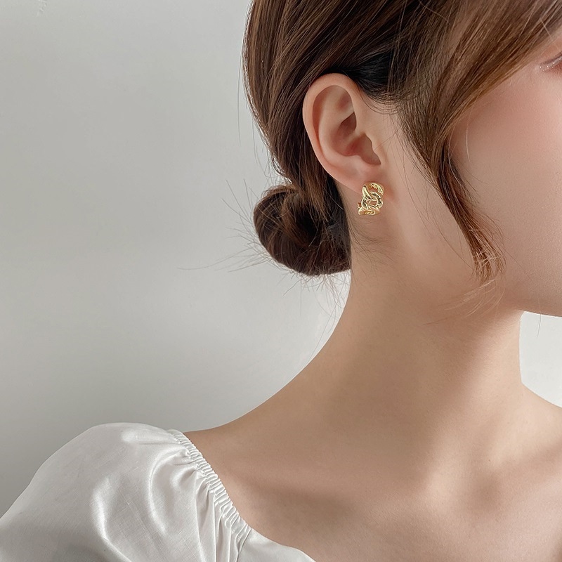 Sterling silver jarum Korea Selatan Dongdaemun trendi hollow winding anting-anting kepribadian fashi