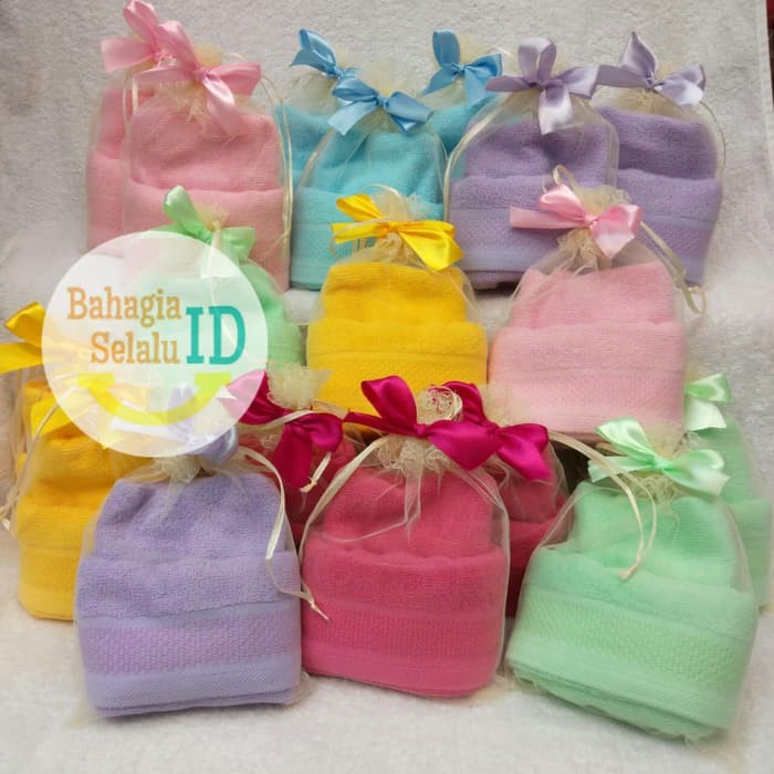 Souvenir Handuk Uk. 30x70 + Packing Tile + Pita