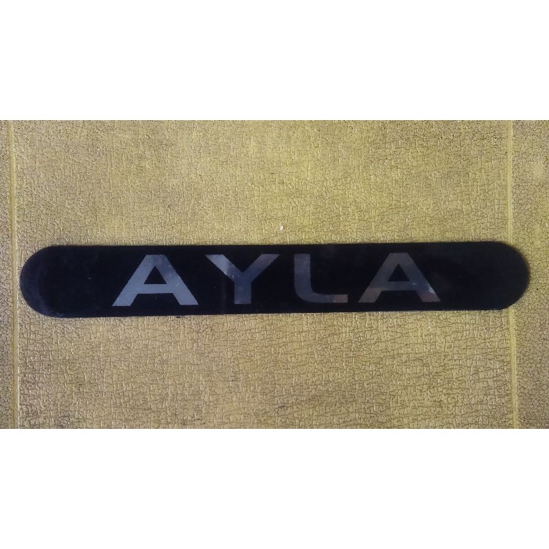 emblem tulisan AYLA untuk bemper belakang