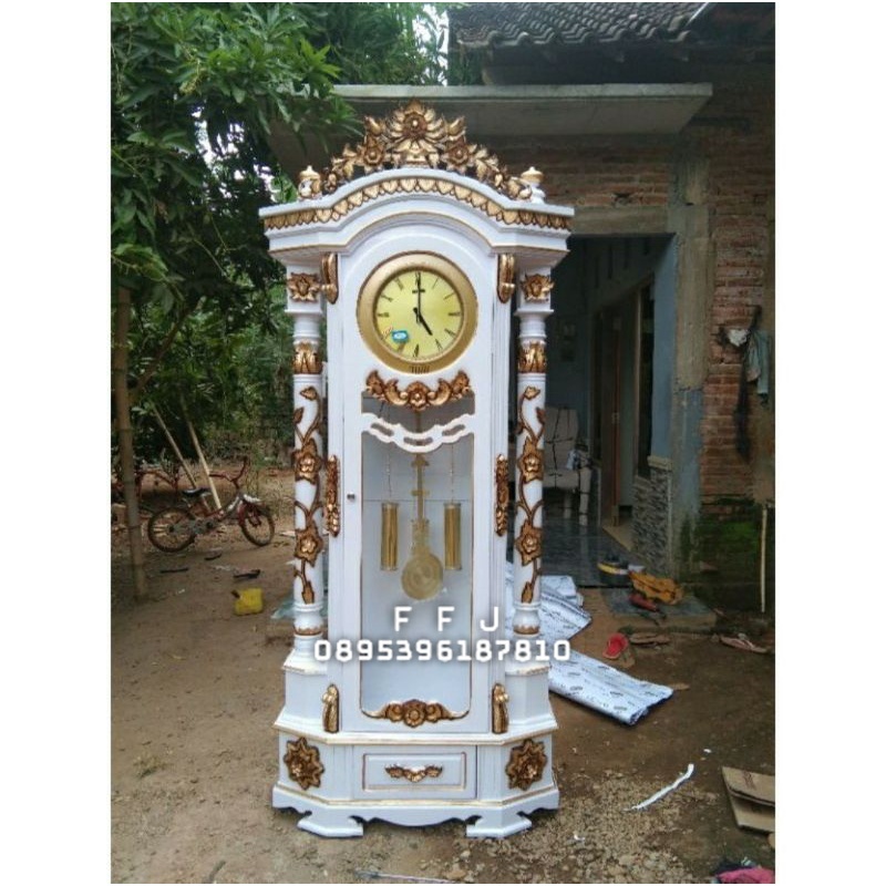 lemari jam hias duco putih lemari jam pajangan lemari jam hias masjid lemari jam ukir Jepara