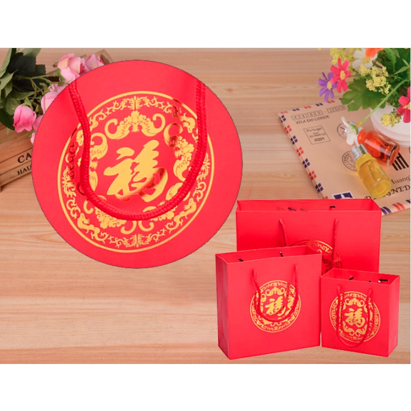 

kantong hadiah imlek, hampers, paper bag merah, paper bag imlek kantong goodie bag