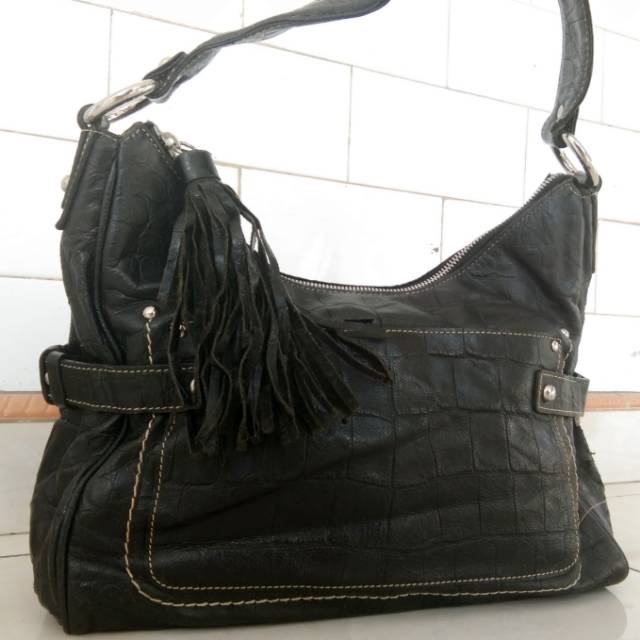 Tas kulit brand Daks