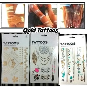 tattoo gold besar