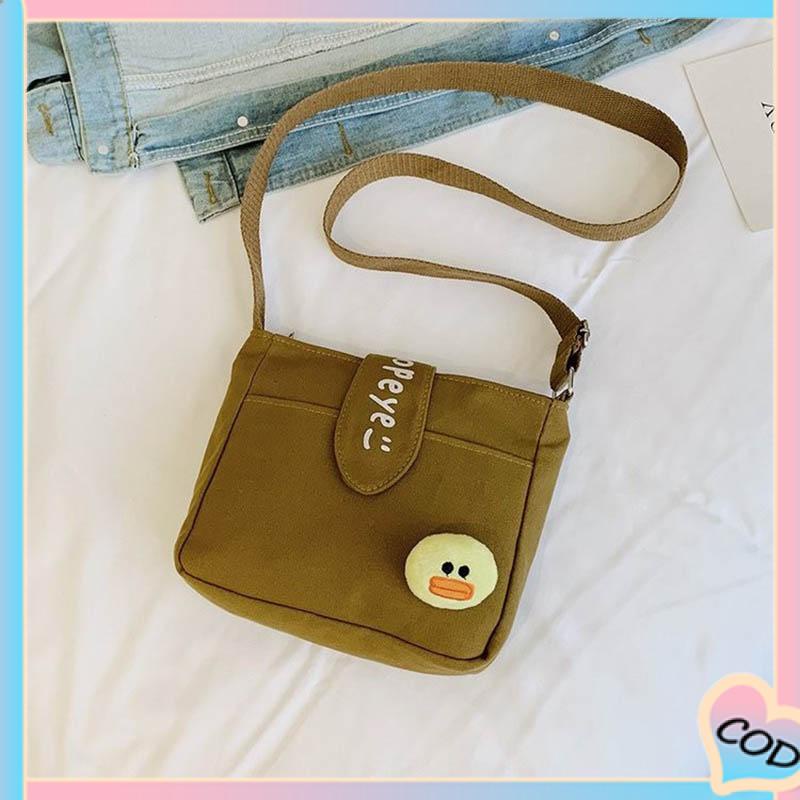 COD❤️ Tas Kanvas Wanita Messenger Tas Kecil Gadis Mahasiswa Kartun Lucu Tas Kanvas Bahu-A.one