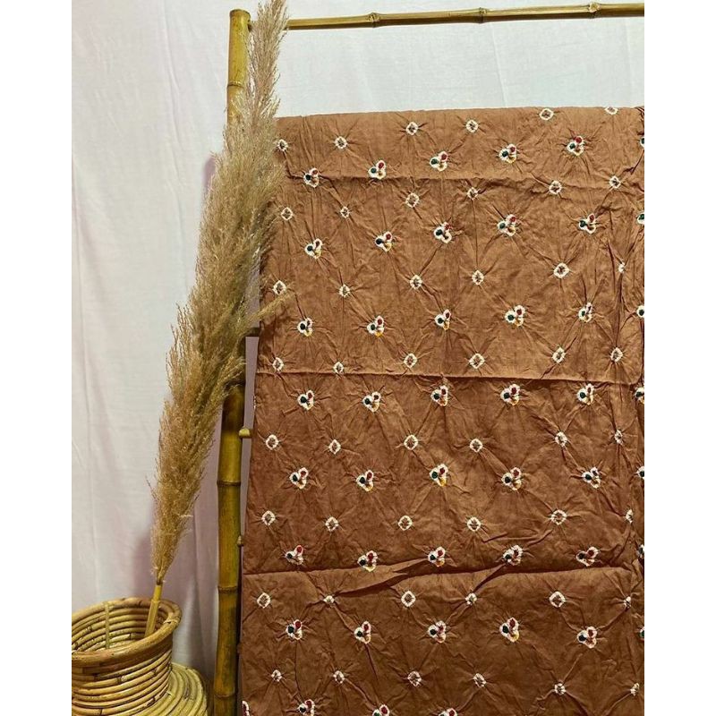 Kain jumputan solo cengkeh coklat