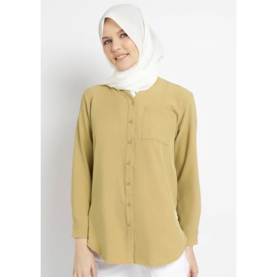 Le Najwa Liodra kemeja