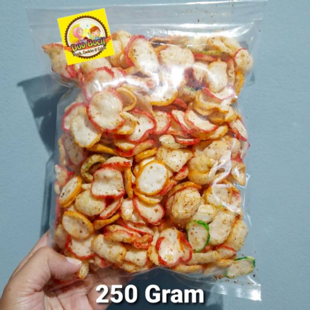 

Kerupuk Seblak Pedas Gurih aroma Kencur 250 Gram - Duo Bocil Snack