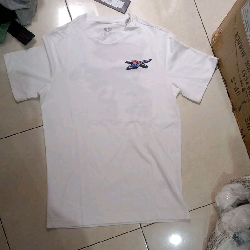 kaos reebok SEASONAL GRAPHIC TEE