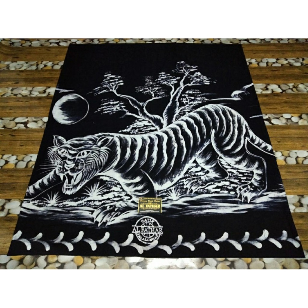 

SARUNG LUKIS ASLI HANDMADE SARUNG KEKINIAN MOTIF MACAN PUTIH