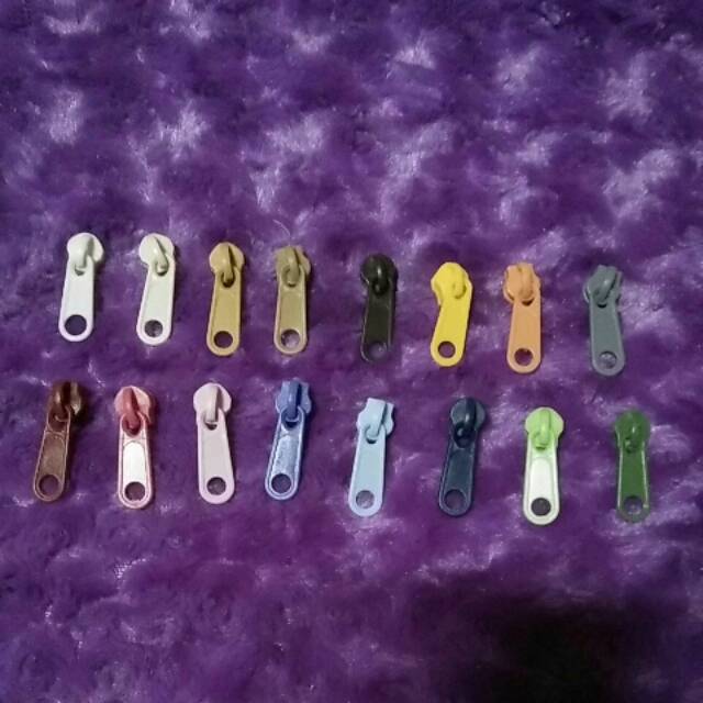 Kepala Resleting plastik no 5 (perlusin)