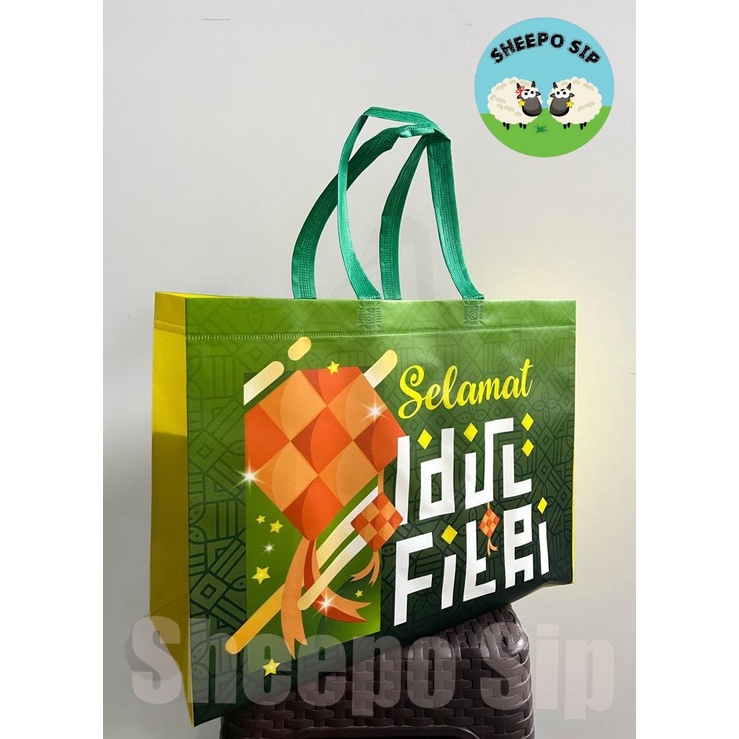 

TAS SPUNBOND LAMINASI FULL COLOR - TAS PARCEL LEBARAN PREMIUM - TAS SEMBAKO IDUL FITRI KUAT 40X31X15