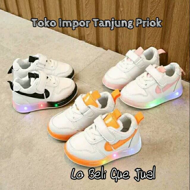 Lo Beli Gue Jual->> Sepatu Anak Cowok Cewek Motif Nike Impor Sole LED Nyala Trendy. TI-1659