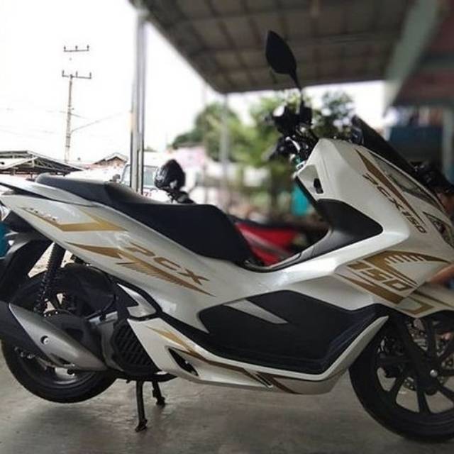 Cutting Stiker striping Motor honda  pcx 150 putih gold.