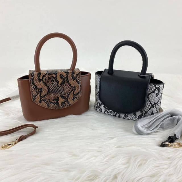 CnK Snake Effect Top Handle Cylinder Bag Original