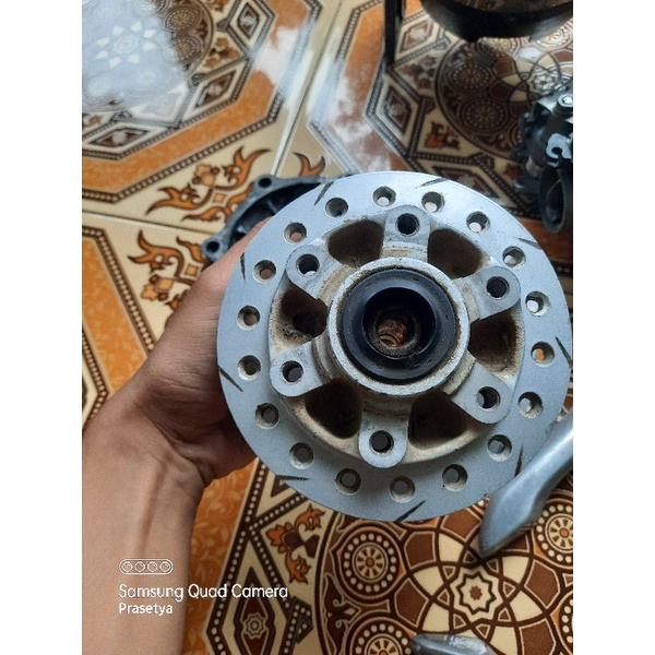 tromol depan ori tiger revo