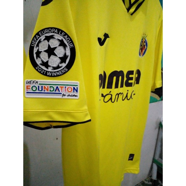 Patch-Velvet-GO-UCL-untuk-Villarreal-21-22+Sponsor-Tangan