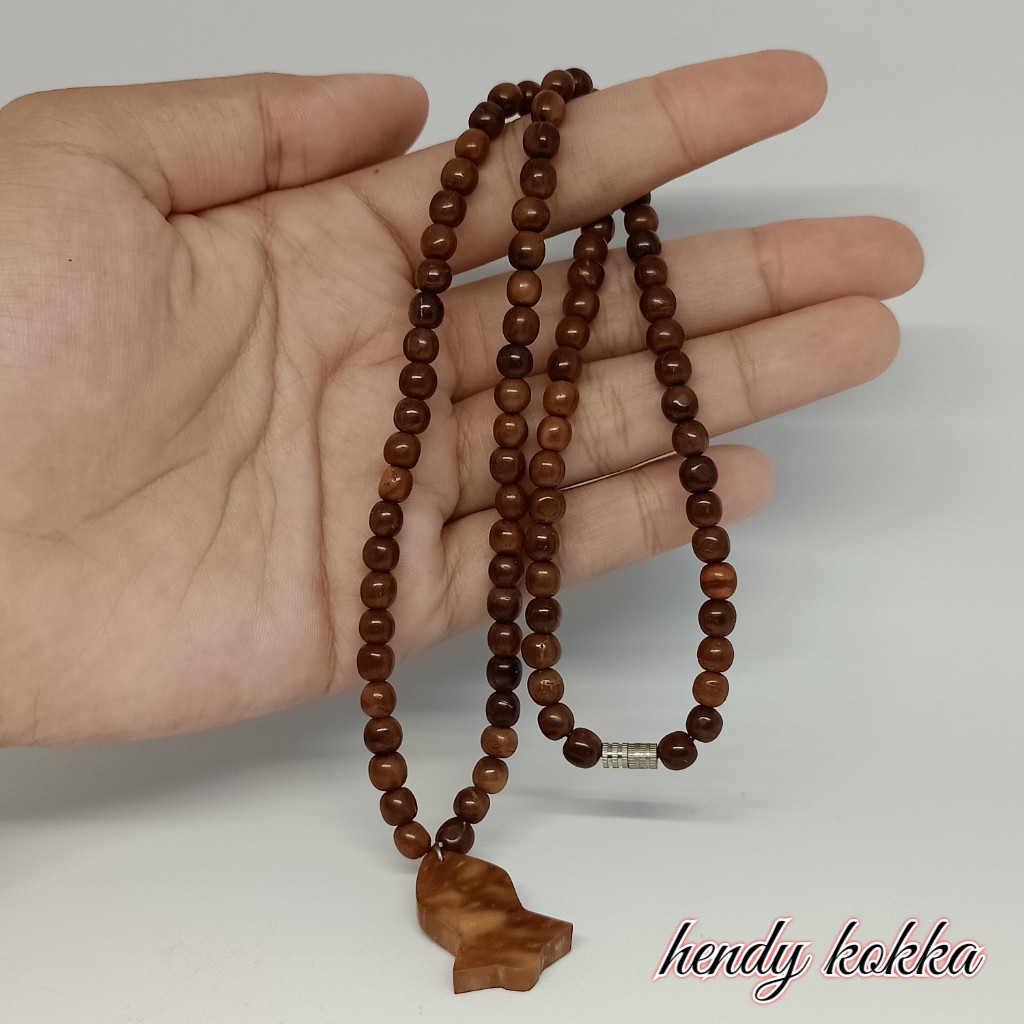 Kalung kokka kaukah terompah hitam