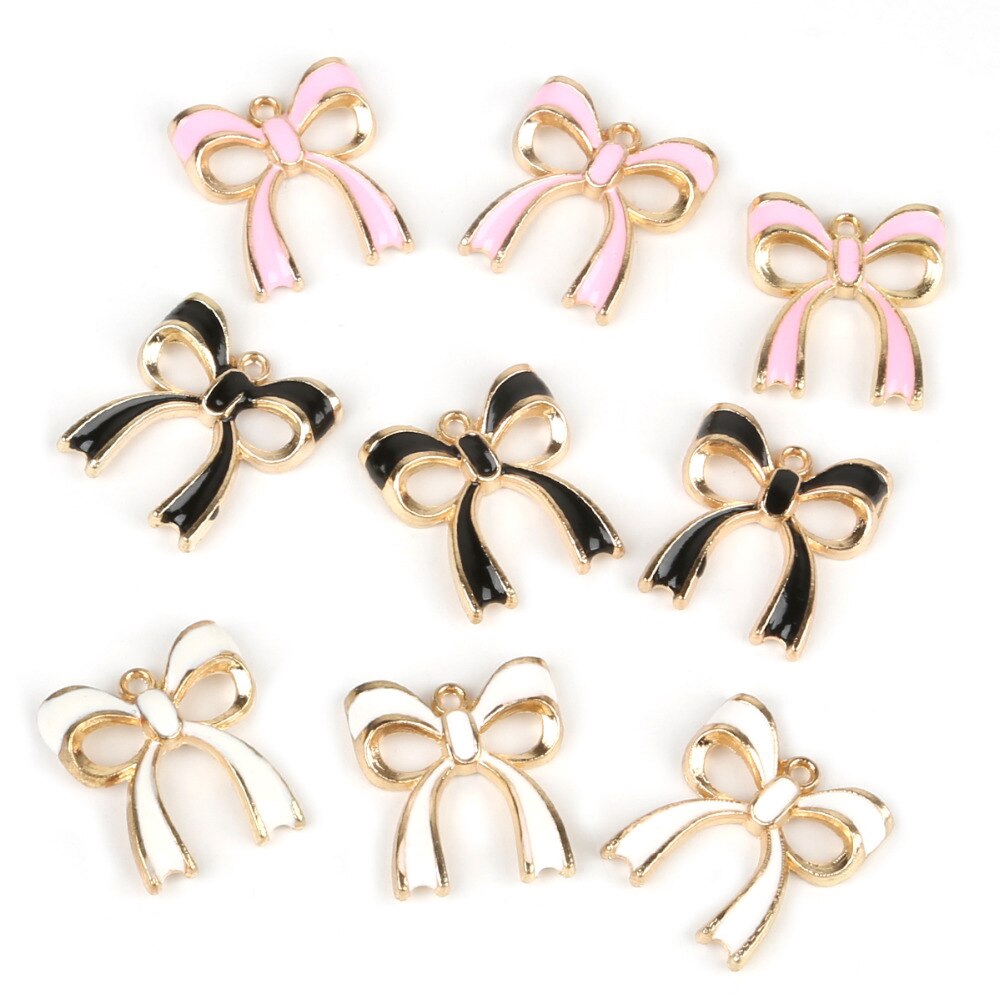 10pcs Liontin Bentuk Pita Warna Pink / Putih / Hitam Bahan Alloy Untuk Membuat Perhiasan