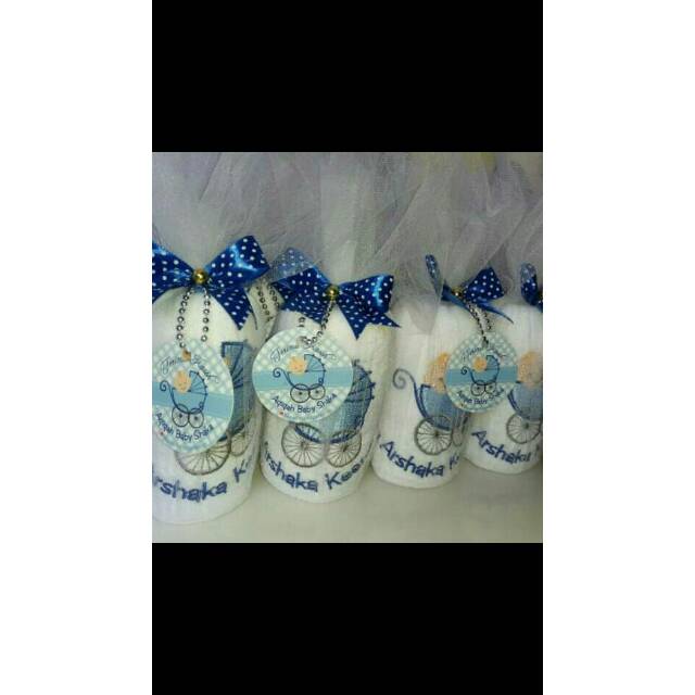 Souvenir Handuk bordir kemas tile