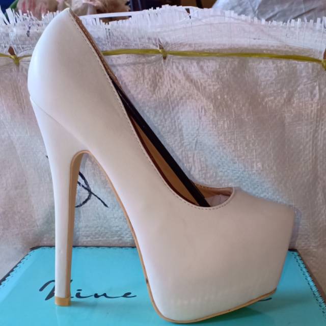 Sepatu highheels nine west