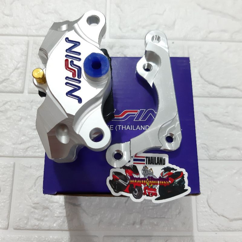 KALIPER 2 PISTON PLUS BREKET WAVE 125 SUPRA 110 SUPRA X 125 KHARISMA