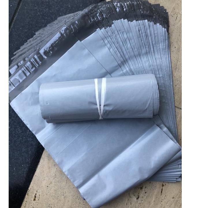 

ホ polymailer ABU-ABU dan KUNING ukuran 20x30 kurang lebih 100 lembar Baru