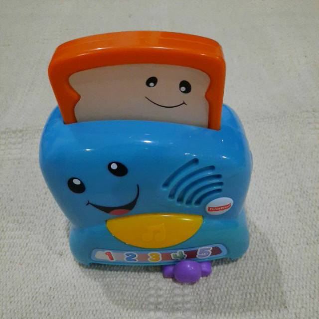 Preloved Fisher price infant learning toaster