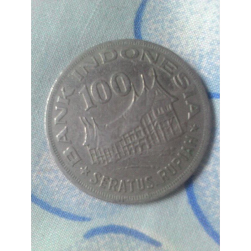 Uang koin Rp100 gambar rumah Padang emisi 1978