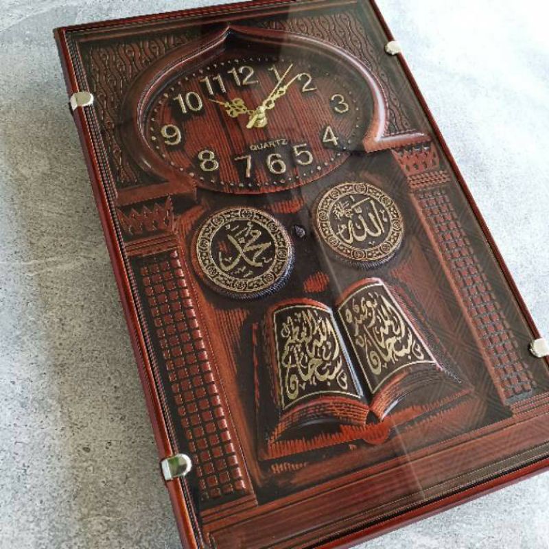 jam dinding kaligrafi kayu timbul
