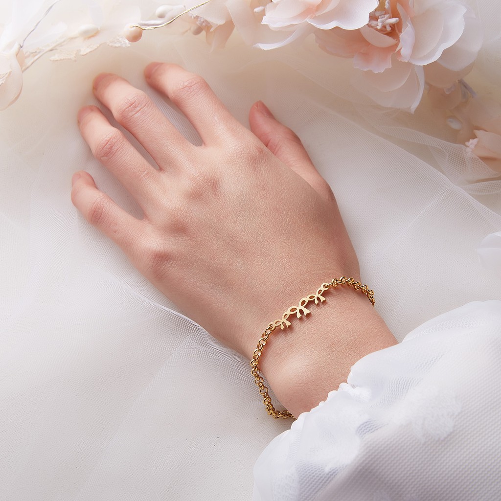 Gelang Tangan Rantai Stainless Steel Aksen Simpul Pita ECG Hollow Untuk Wanita