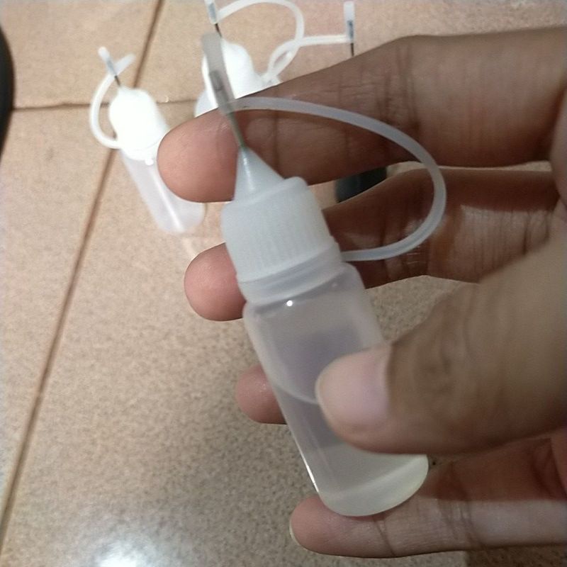 Botol isi ulang lem uhu/lem astero