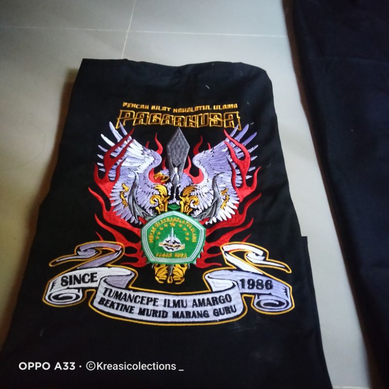 Sakral bordir pagar nusa motif Garuda