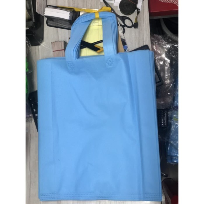 

NEW TAS KAIN / GOODIE BAG / SPUNBOND UKURAN 38 X 45 X 9