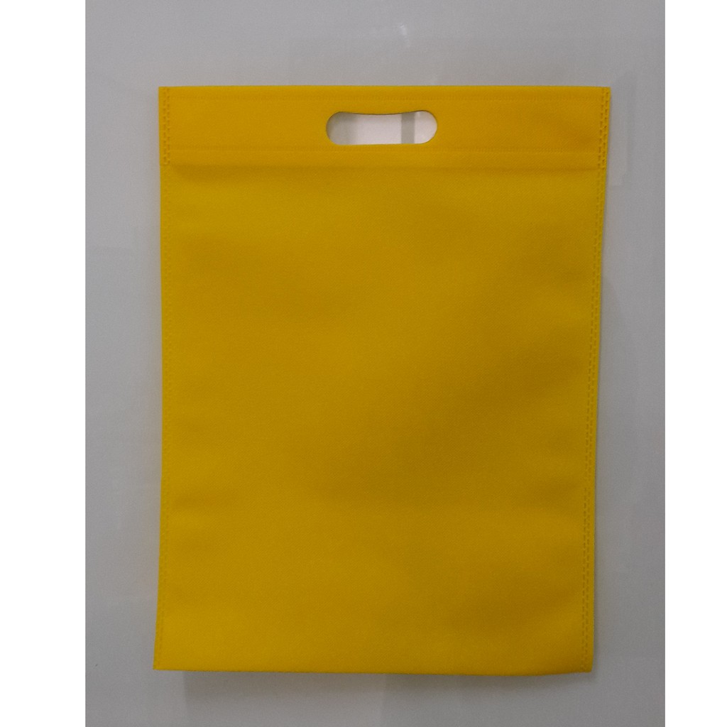 

Tas Press Spunbound Oval Goodie Bag Tas Belanja Warna Kuning 30 cm x 40 cm