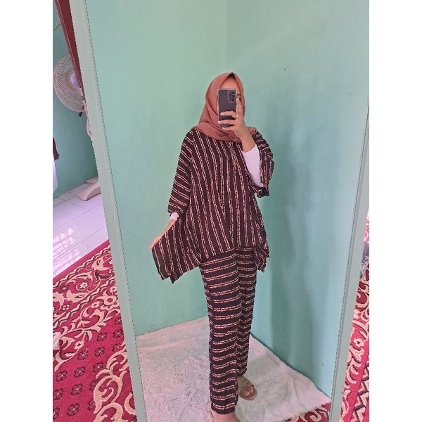 Setelan waka waka jumbo otina