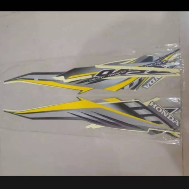 Striping motor Honda Revo absolute 2009 kuning hitam