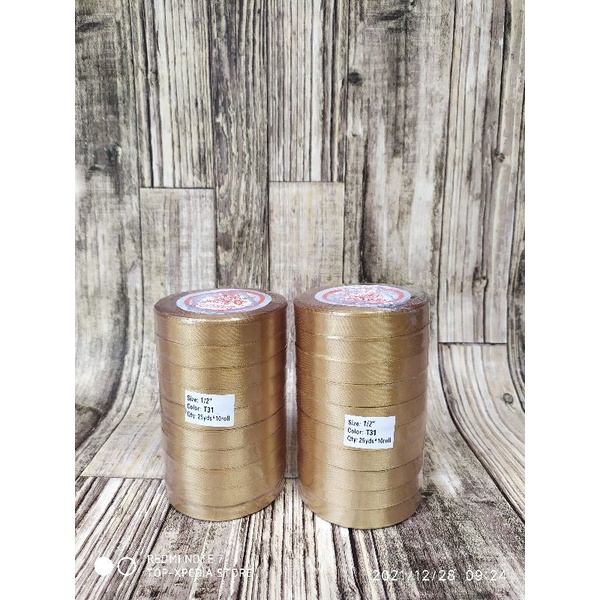 

Pita Satin 1/2inch 25yard atau 23meter merk sakura warna coklat muda gold