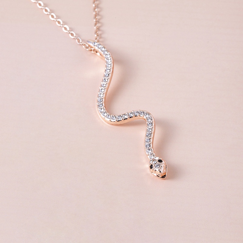 Fancyqube Kalung Rantai Liontin Bentuk Ular Aksen Zircon Warna Pelangi Untuk Perhiasan Wanita