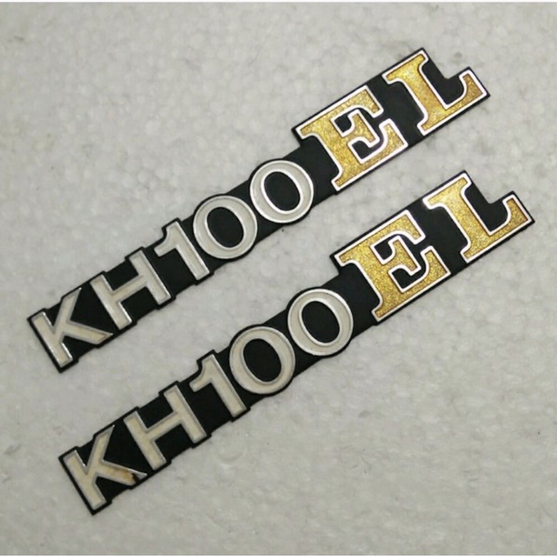 EMBLEM BOX ACCU KAWASAKI KH100 EL