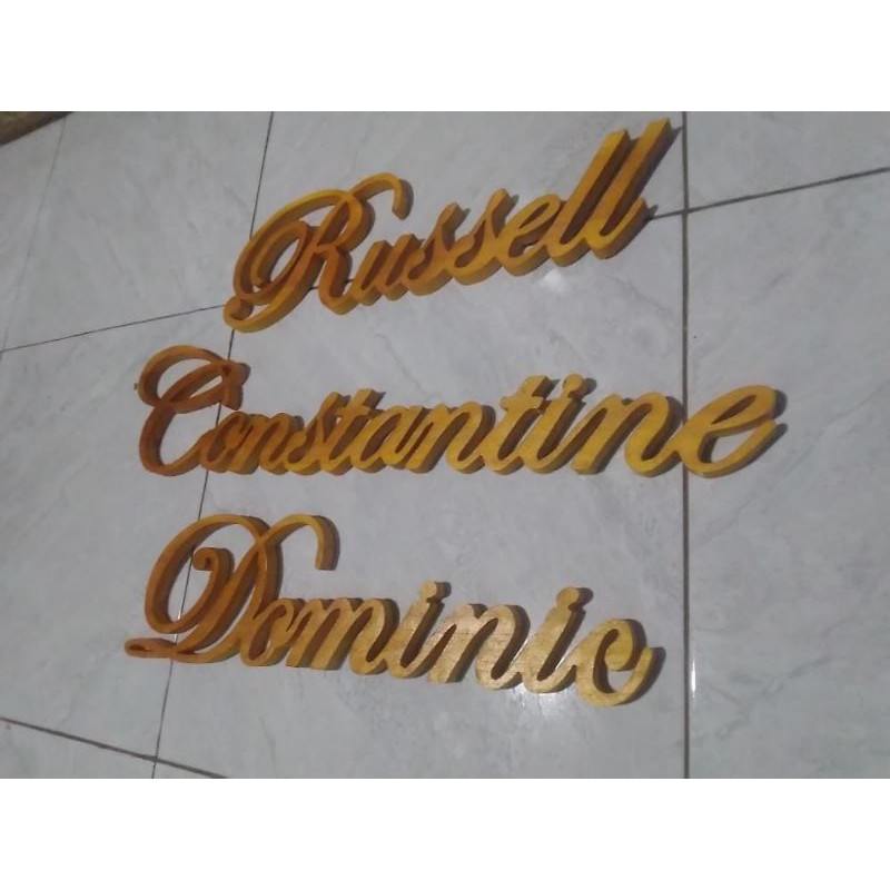 tulisan timbul dari kayu