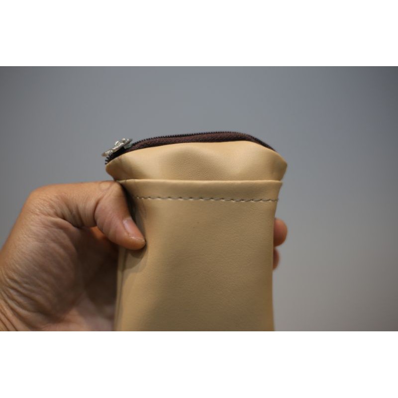 Dompet mbako atau selpen